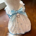 Detail view of blue heart print dog dress with satin bow and metal D-ring attachment - Blue Heart Dress
