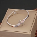 Detailed view of silver crossover bracelet with floral crystal accents on a jewelry box - Flower Double Layer Style (1#)