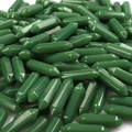 Macro shot of polished green natural crystal hexagonal pointed bullet pendants - Green Aventurine