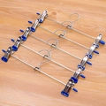 Set of 5 stainless steel pants hangers with blue anti-slip coating on wooden surface - Small Soft Bead / Blue