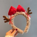 Beige plush Christmas headband featuring brown velvet antlers and a red velvet bow - Bowknot Antlers Headband