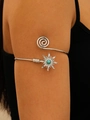 Silver bohemian arm cuff with sun pendant and turquoise bead on model's upper arm - Sun Spiral Turquoise Style (3489)