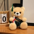 Brauner Absolventen-Bär mit grünem Talar und Doktorhut als Geschenk zum Abschluss - Hellbrauner Bär-Grüne Kleidung / 18cm