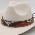 Beige wool felt cowboy hat featuring a brown leather band with steer skull and orange patches - One Size / Mountain Bull