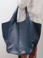 Detail showing the vintage texture and large capacity of the navy blue tote bag - Sapphire Blue