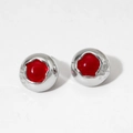 Detail of silver round stud earrings featuring vibrant red gemstones and polished metal finish - Silver Red (D2611)
