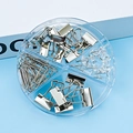 Zilveren binderclips en paperclips in een transparante opbergdoos met vier compartimenten - Zilver