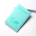 Detail view of mint green PU leather passport holder with embossed world map and airplane - Lake Blue