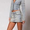 Ensemble en denim bleu délavé rétro avec crop top étoile et mini-jupe boutonnée - L / Bleu clair