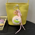 Ciondolo mostro di peluche rosa con bocca verde su borsa a secchiello gialla - Rosa