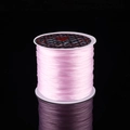 Spool of vibrant pink elastic stretch cord for DIY beaded jewelry making and bracelets - Pink