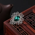 Vintage style hollow lace silver brooch with a large pear-shaped green gemstone - Retro Antique Silver Green Style (0017)