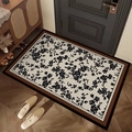 Floral French vintage PVC entryway mat with black roses and brown border on wood floor - French Faman Floral - Rectangular