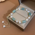 Elegant strawberry crystal bracelet with green jade beads and pearls on a velvet jewelry box - Real Gold Plated Bamboo Pearl Bracelet-Green