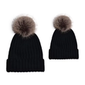 Detail of adult and child black knit beanies with fluffy brown faux fur pom-poms - Parent-Child Set / Black