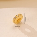 Macro shot of 8mm gold spacer bead with cubic zirconia and size dimensions labels - Gold Pavé Ring