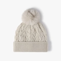 Winter fleece-lined knit pompom beanie in cream white featuring a classic cable pattern - One Size / Beige