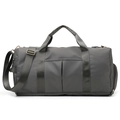 Grey cylindrical gym bag with golden hardware and adjustable strap for sports - Thickened Grey