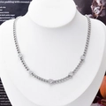 Elegant silver heart necklace with five sparkling pave pendants on a white mannequin - Necklace Steel