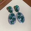 Elegant emerald green zircon flower dangle earrings with sparkling micro-pavé stones. - Flower Tassel Style (20#)