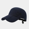 Detail of dark blue quick-dry cap showing laser-cut side vents and circular logo - Adjustable / Navy Blue