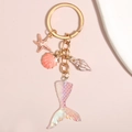 Mermaid tail keychain with pink starfish and shell pendants in gold finish - Iridescent Starfish Shell Mermaid Tail Style (E4908)