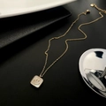 Elegant gold titanium necklace with a square shell pendant featuring a smiling face icon - Titanium Steel/Shell / Gold