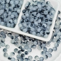 Macro shot of 6mm/8mm gradient glass beads in black and blue for DIY jewelry making - Black White Two-tone Beads (6mm)