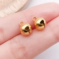 Pair of small polished golden alloy bell pendants for DIY jewelry and crafts - 8mm / Gold