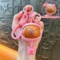 Cute pink Capybara keychain charm with a rotating face feature for school bags - Turning Face Pendant - Pink