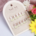 Close-up of French press-on nails with cartoon bear designs and a metallic brown finish - By1773 / Glue Type