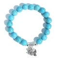 Blue turquoise bead bracelet featuring a silver owl charm and matching spacer beads - Blue Turquoise Large Owl Charm