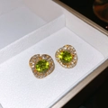 Gold plated teardrop earrings with emerald green zircon and pavé crystal accents - Intertwined Hollow Green Zirconia Silver Earring Post Studs