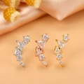Detail showing star zircon cartilage studs in silver, rose gold, and gold plating - Style 8
