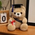 Brown plush graduation teddy bear with black mortarboard and blue sash gift - Black Sash Style / Camel