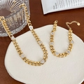 Parure collier et bracelet gourmette dorés avec cœurs ornés de strass brillants - Collier Doré (CDK857)