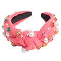 Detail of pink knotted fabric headband with colorful rhinestones and white pearls - Watermelon red
