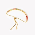 Detailed shot of adjustable golden bolo bracelet featuring colorful pavé zircon stones - Adjustable Drawstring / Warm Tone Gold