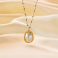 Baroque pearl pendant necklace with gold beaded chain on champagne silk background - [H1192] Oval Pearl Gold
