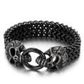 Vintage punk bracelet with dual skull charms and black circular spring clasp - Skull / Silver Black