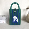 Knitted green striped sunflower tote bag with panda pattern and button closure - Panda Blue & Green