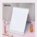 Tragbarer klappbarer Schminkspiegel in Weiß aus Kunstleder auf einem rosa Schminktisch - Klein / Elfenbein