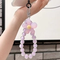 Detail of purple macaron beaded phone strap with cute flower charm and silver clasp - Purple Flower Purple Beads