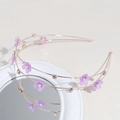 Detail of double-layer rose gold headband with purple flowers, pearls and rhinestones - Purple
