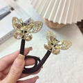 Paire d'élastiques à cheveux papillon dorés ornés de strass champagne scintillants - Papillon en Cristal Champagne