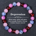 Macro detail of natural stone beaded bracelet with healing crystals for emotional balance - Multi-color Energy Mix Round Beads (Depression-4)