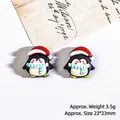 Cartoon penguin resin charm with Christmas hat and blue scarf for DIY crafts, 23x23mm - Christmas Penguin