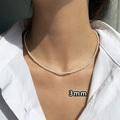 Close-up of 3mm irregular geometric pearl necklace on model in vintage French style - 29# Gold White 3mm Pearl Necklace