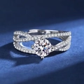 Elegant silver ring featuring interlocking bands with a round brilliant cut moissanite - JZ043 (2 Carats)