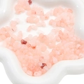 Pink translucent irregular acrylic beads for DIY handmade bracelets in a white bowl - Nude Pink